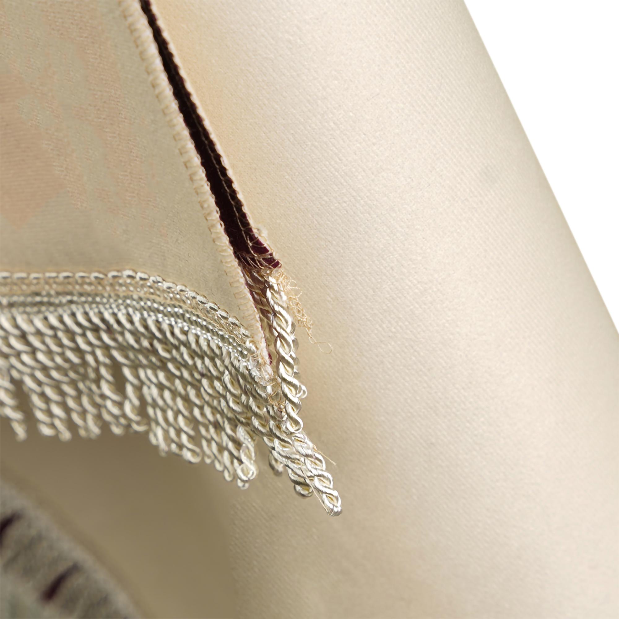Detail: layered satin stitch on linen